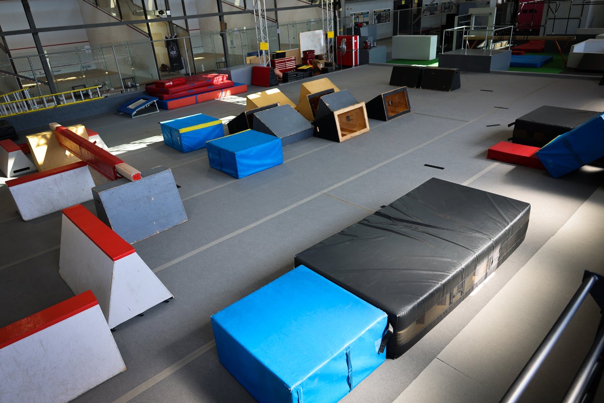 Padded landing mats and obstacle ramps
