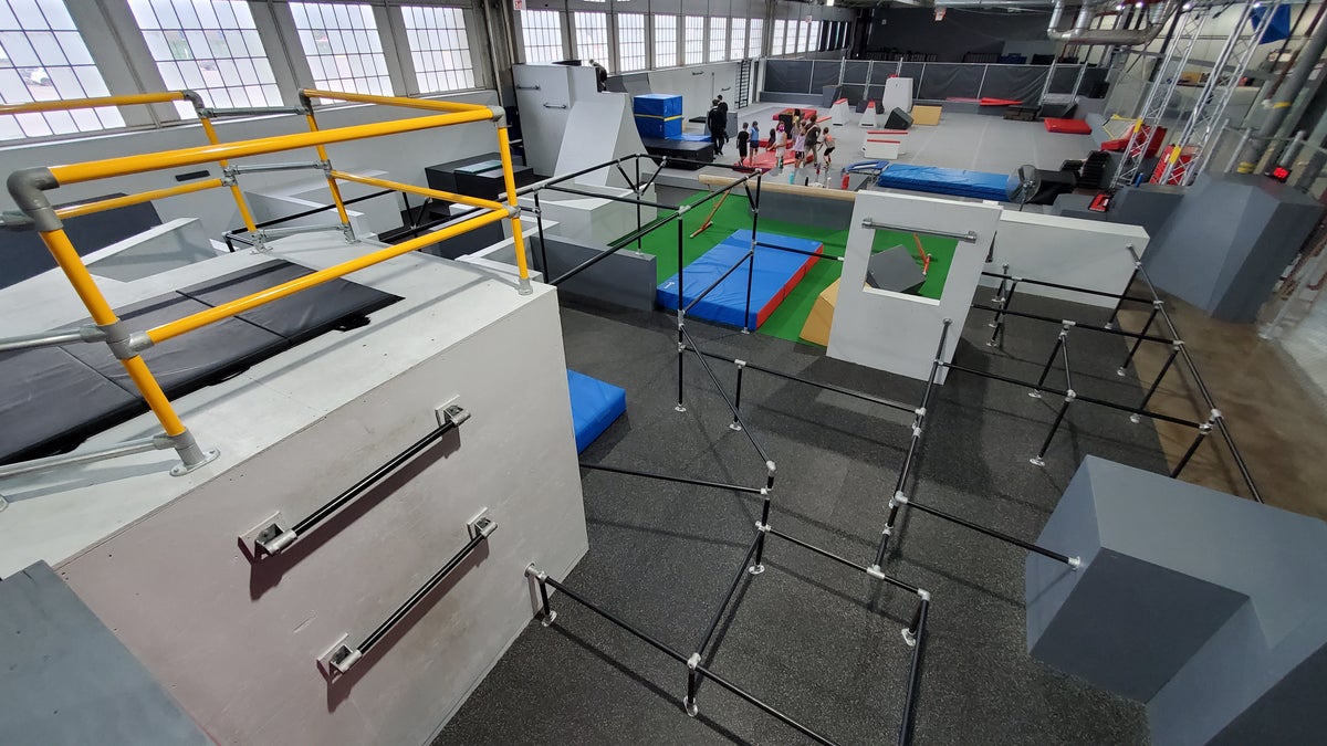 Rails, bars and trampoline training zone